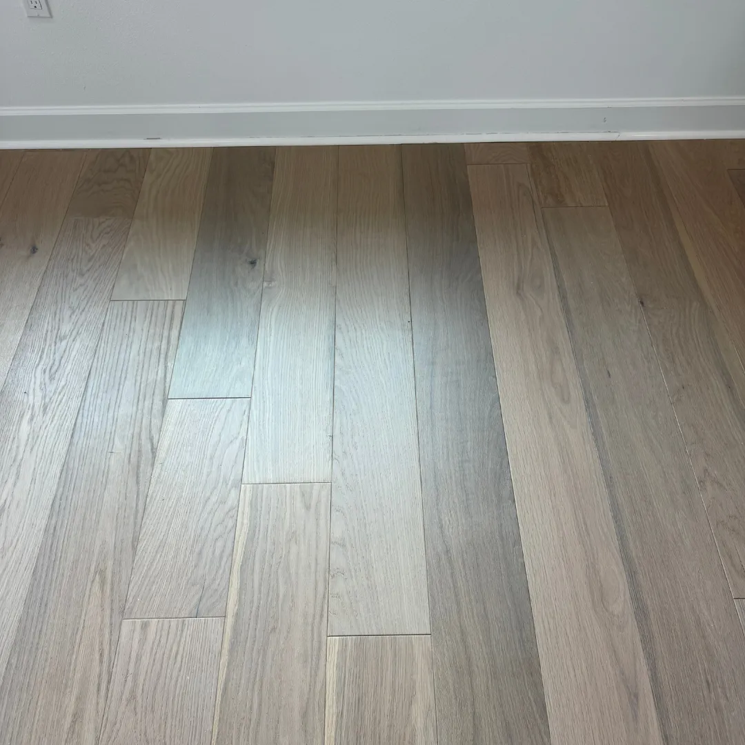 White oak hardwood floor installation with engineered planks