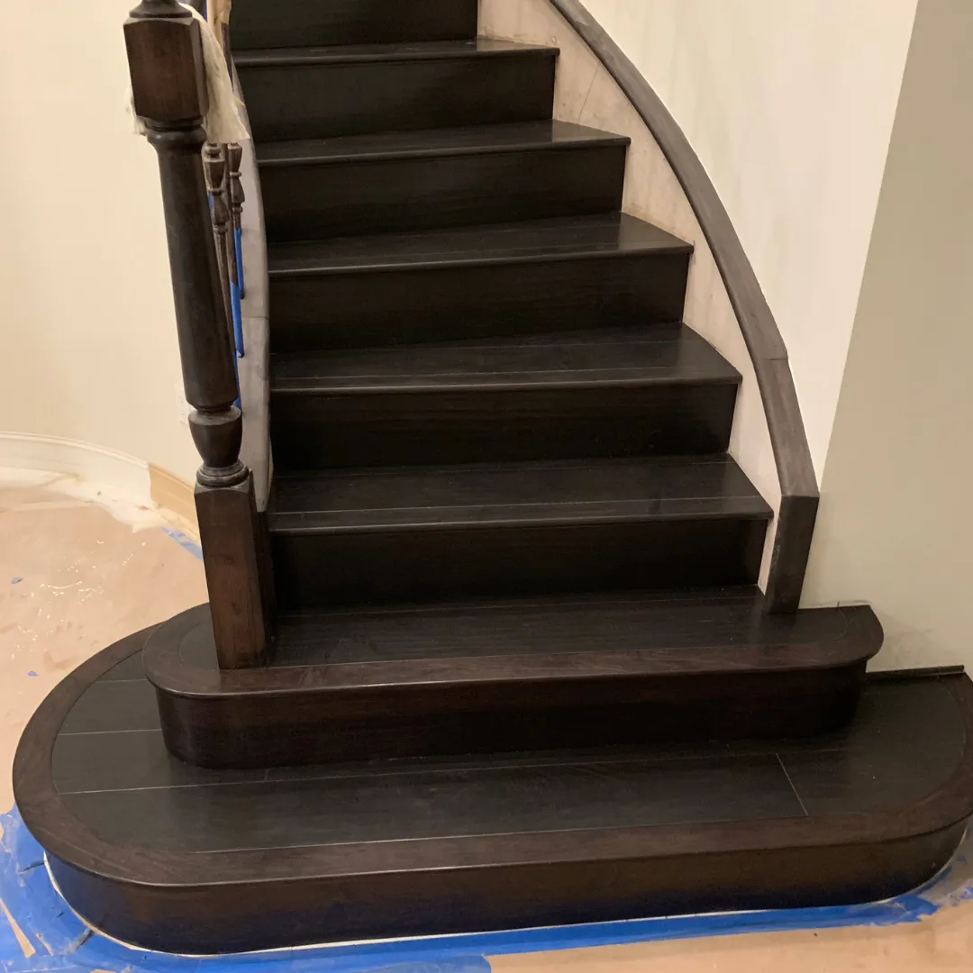 Custom dark walnut staircase installation by DRS Floors