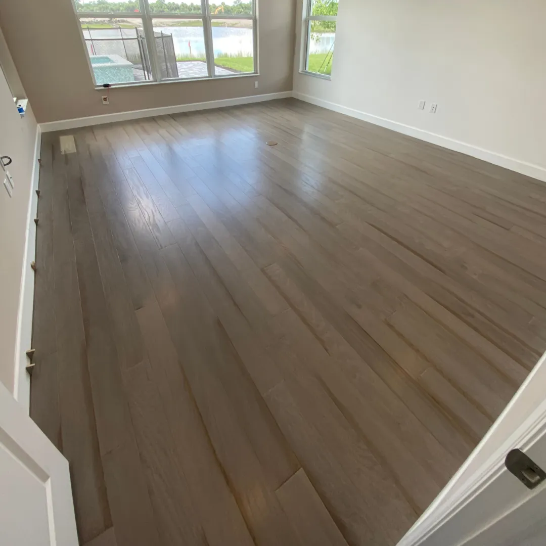 Oak hardwood flooring installation in Lee County, FL bedroom