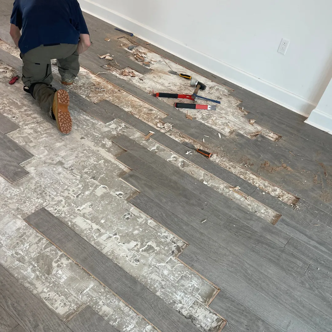 DRS Floors technician installing waterproof vinyl plank flooring